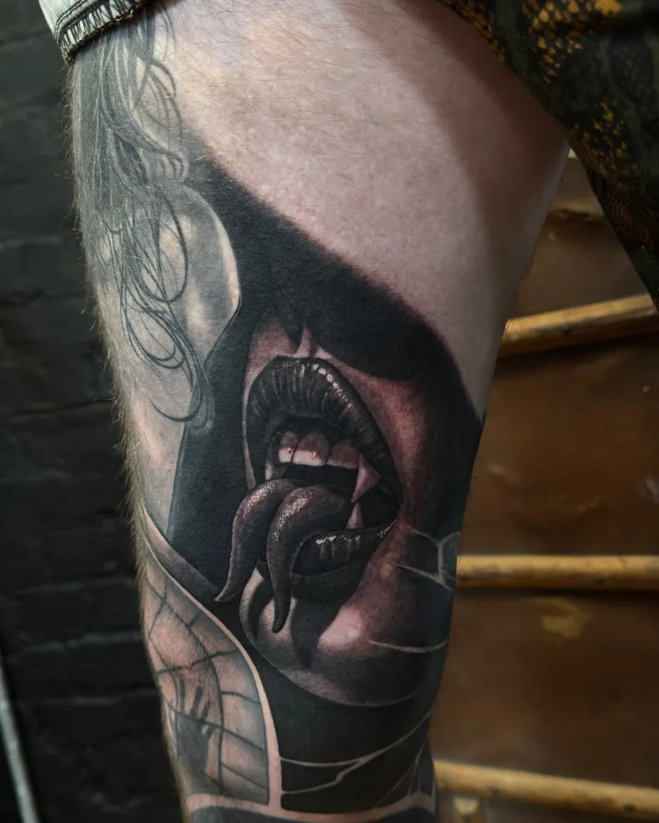 Vampire portrait thigh tattoo
